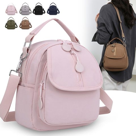 Pink nylon bag with a front flap
