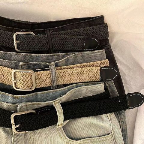 Woven stretch belts in black, khaki and grey