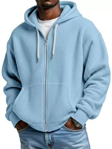 Light blue full-zip waffle hoodie worn over a white T-shirt