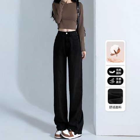 Black wide-leg jeans worn with a brown top