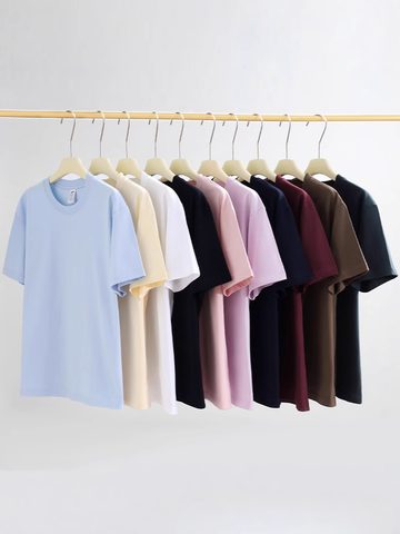 Plain cotton T-shirts in eight colours on hangers